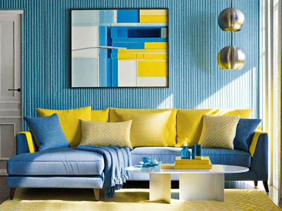 Blue yellow couch pillows table