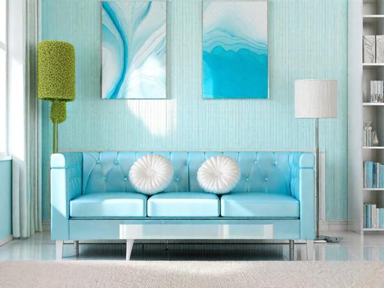 Blue couch in teal living room