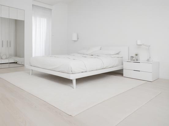 White minimalist bedroom setup