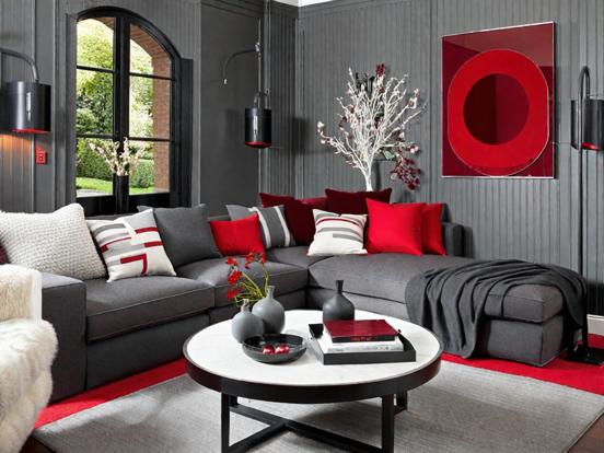 Gray couch red accents room