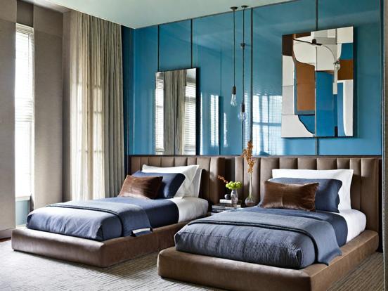 Elegant dual-bed blue bedroom