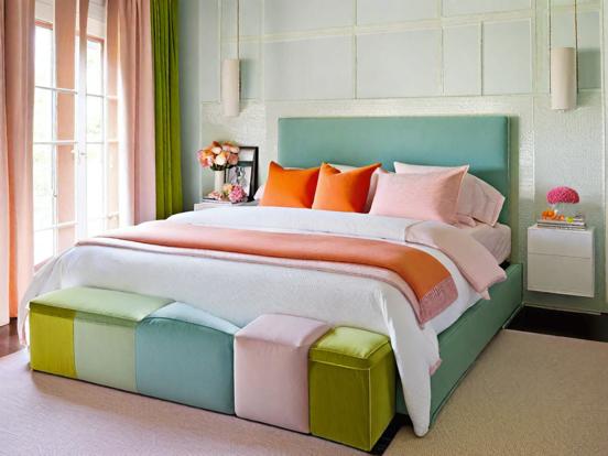 Cozy pastel bed with pillows