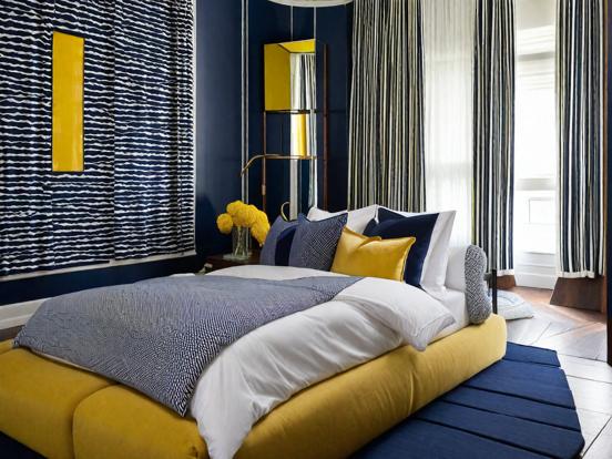 Closeup of blue yellow bed