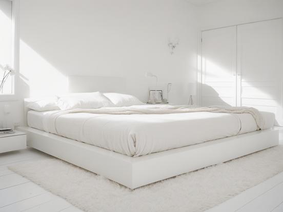 White minimalist bedroom setup