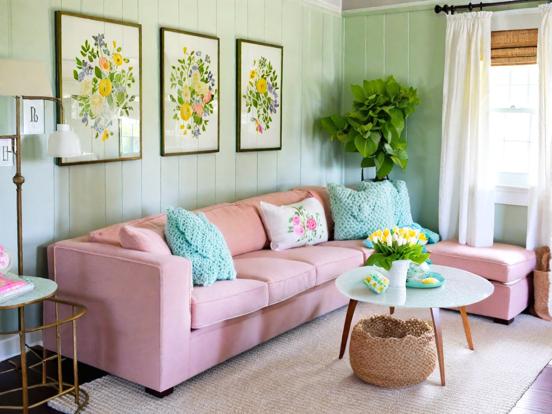 Pink couch green wall room