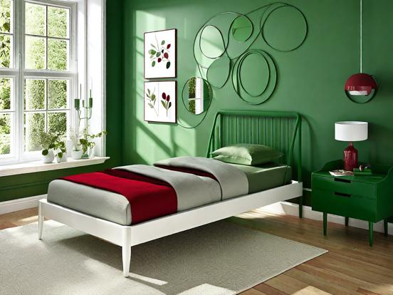 Green bedroom white bed red sheets