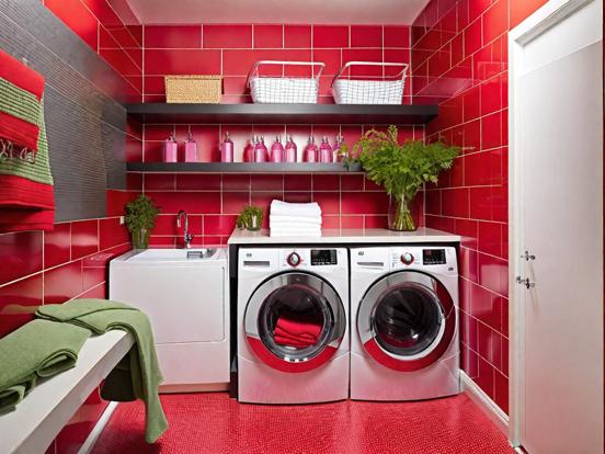 Red tiled bathroom with washer