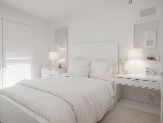 White serene bedroom with bed