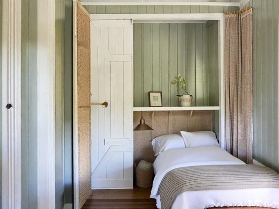 Cozy bedroom with white bed