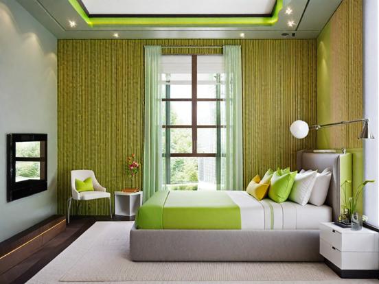 Green hue bedroom with TV