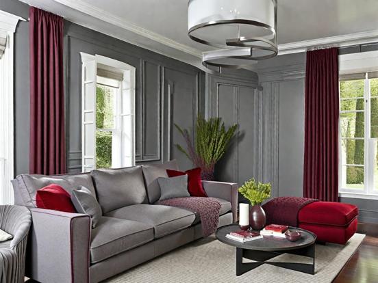 Cozy grey living room red accents