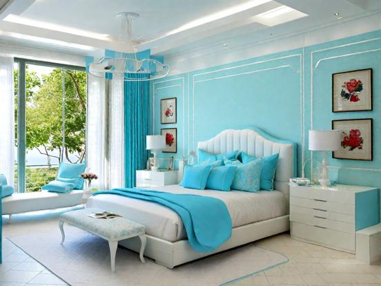 Blue bedroom with bed and chair