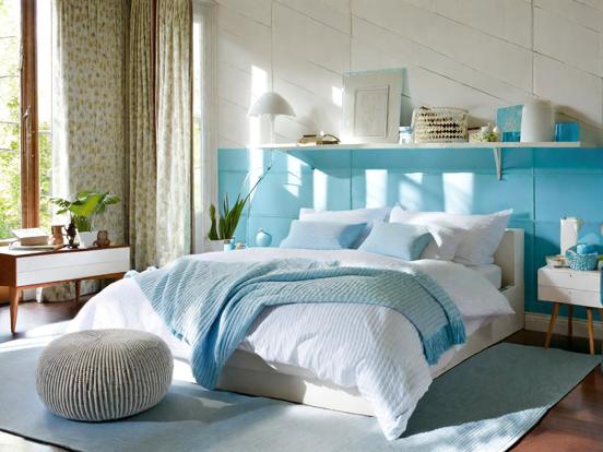 Blue headboard white bed serene