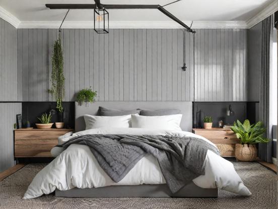 Serene grey bedroom with plant