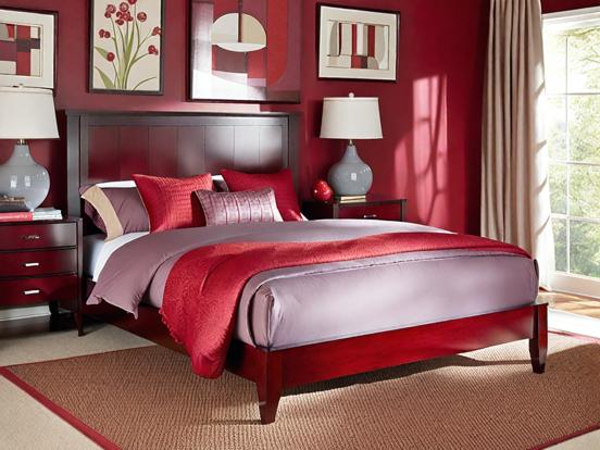 Cozy red bedroom with plush bed