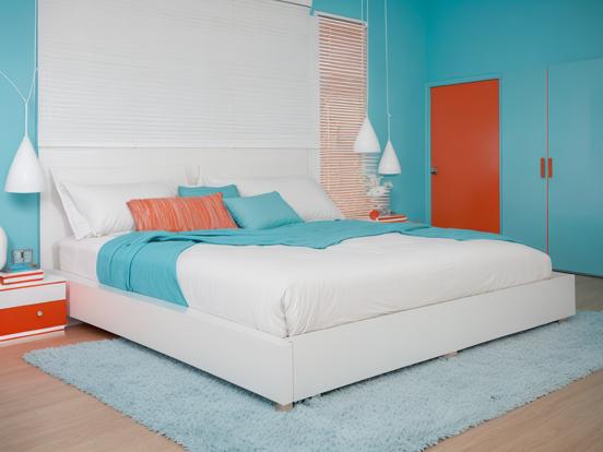 Bright teal orange bedroom