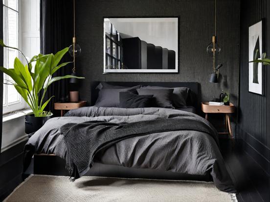 Dark serene bedroom with bed