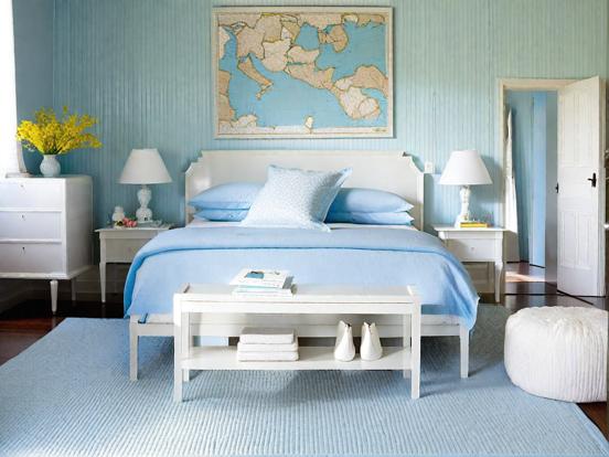 Blue bed white bench serene room