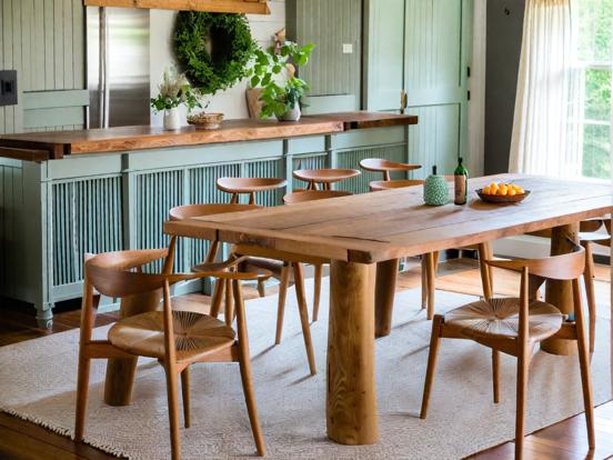 Wooden table chairs room window