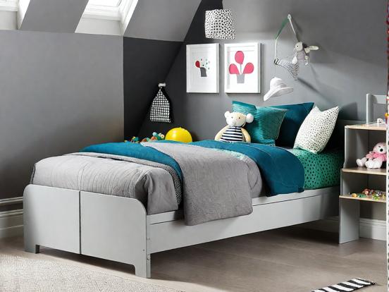 Blue gray king bed in child's room