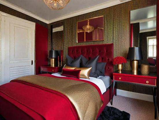 Red gold bedroom with luxe decor