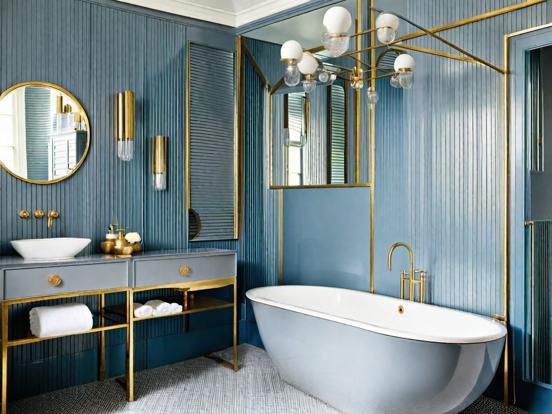 Gold faucet blue wall bath