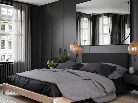 Dark bedroom with black decor