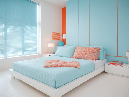 Closeup of bed blue orange room