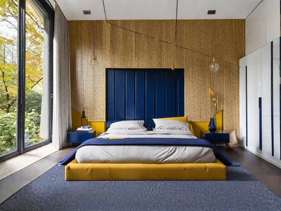 navy and mustard bedroom