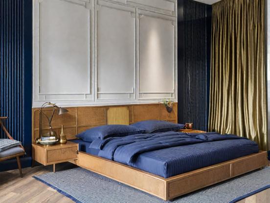 Serene 1920s gold blue bedroom