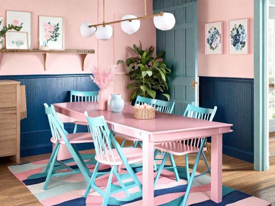 Pink table blue chairs rug