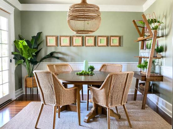 Dining table setup with green decor