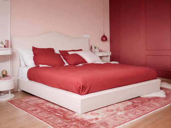 Red bed white nightstand pink room