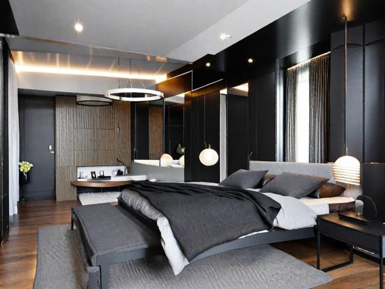 Dark serene bedroom with bed