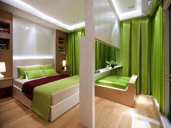 Green bedroom closeup with bed