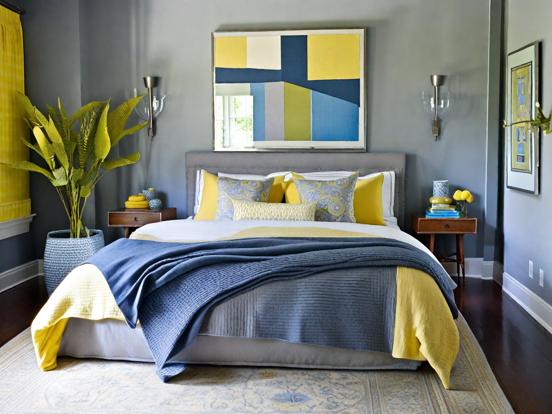 Blue bed yellow pillows