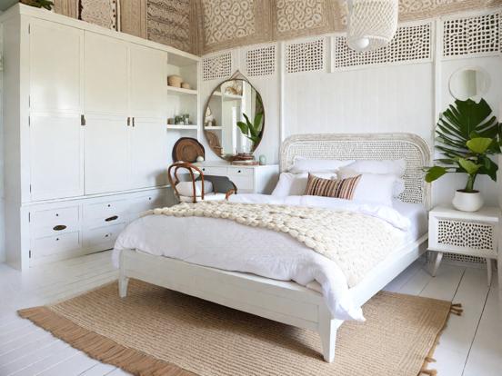 White boho bedroom with decor