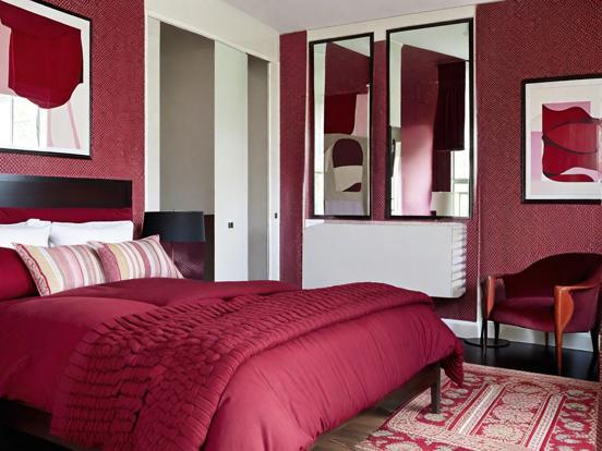 Red bedroom with red chair