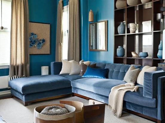 Blue couch in bright blue room