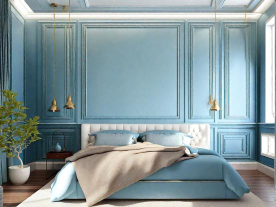 Closeup of bed in blue room