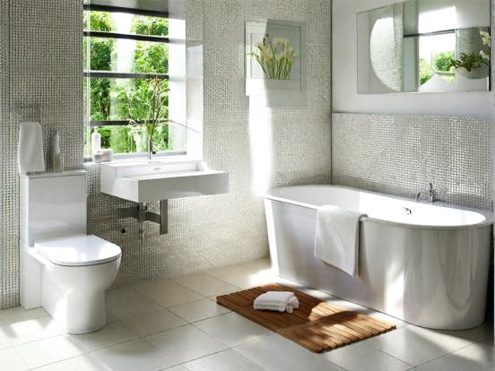 White bathtub beside toilet