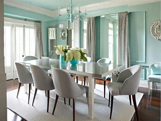 Teal dining room with decor