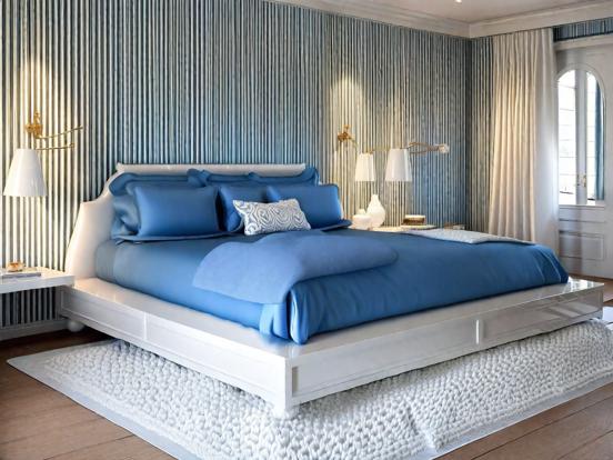 Blue bed white rug serene room