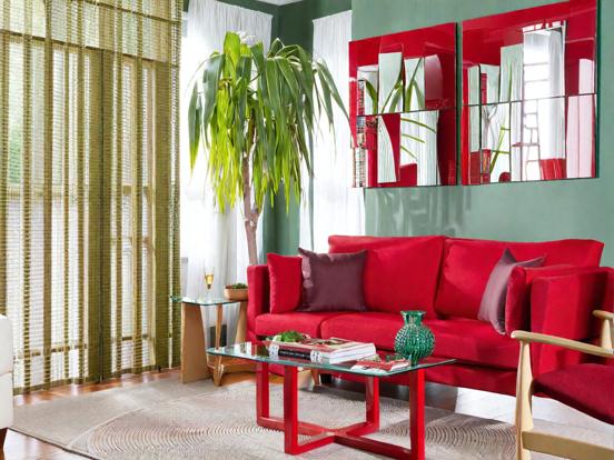 Red couch green living room