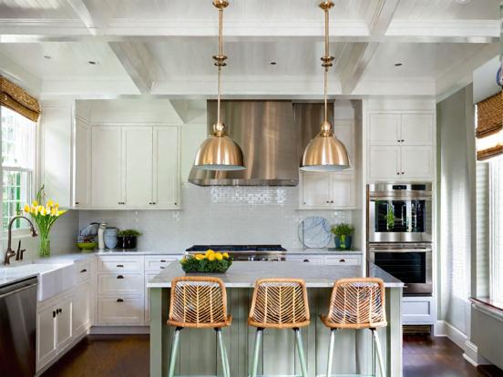 Kitchen island stove copper accents