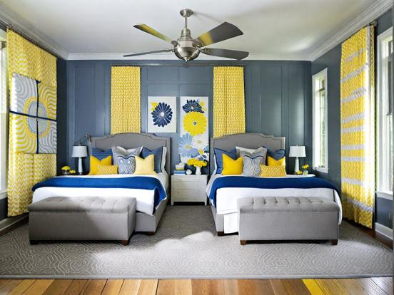 Two beds blue yellow room