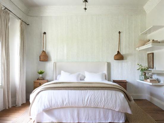 Serene white bed wooden floor