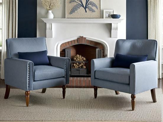 Blue chairs by fireplace lounge