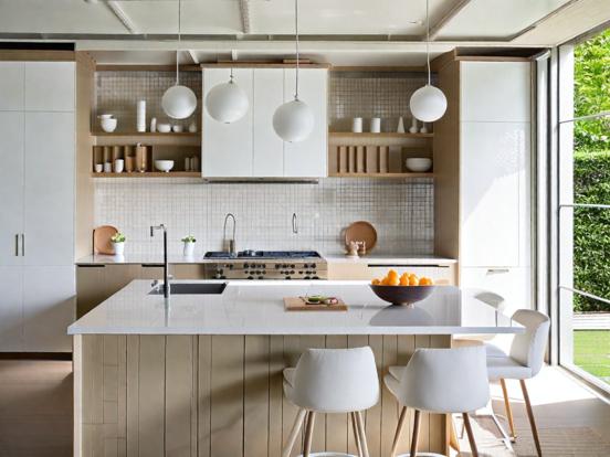 White kitchen closeup counter chairs