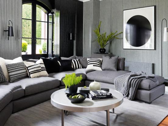 Chic gray couch dark room vibe